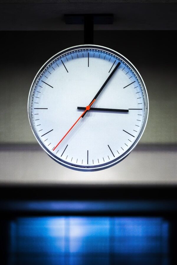 white analog watch at 10